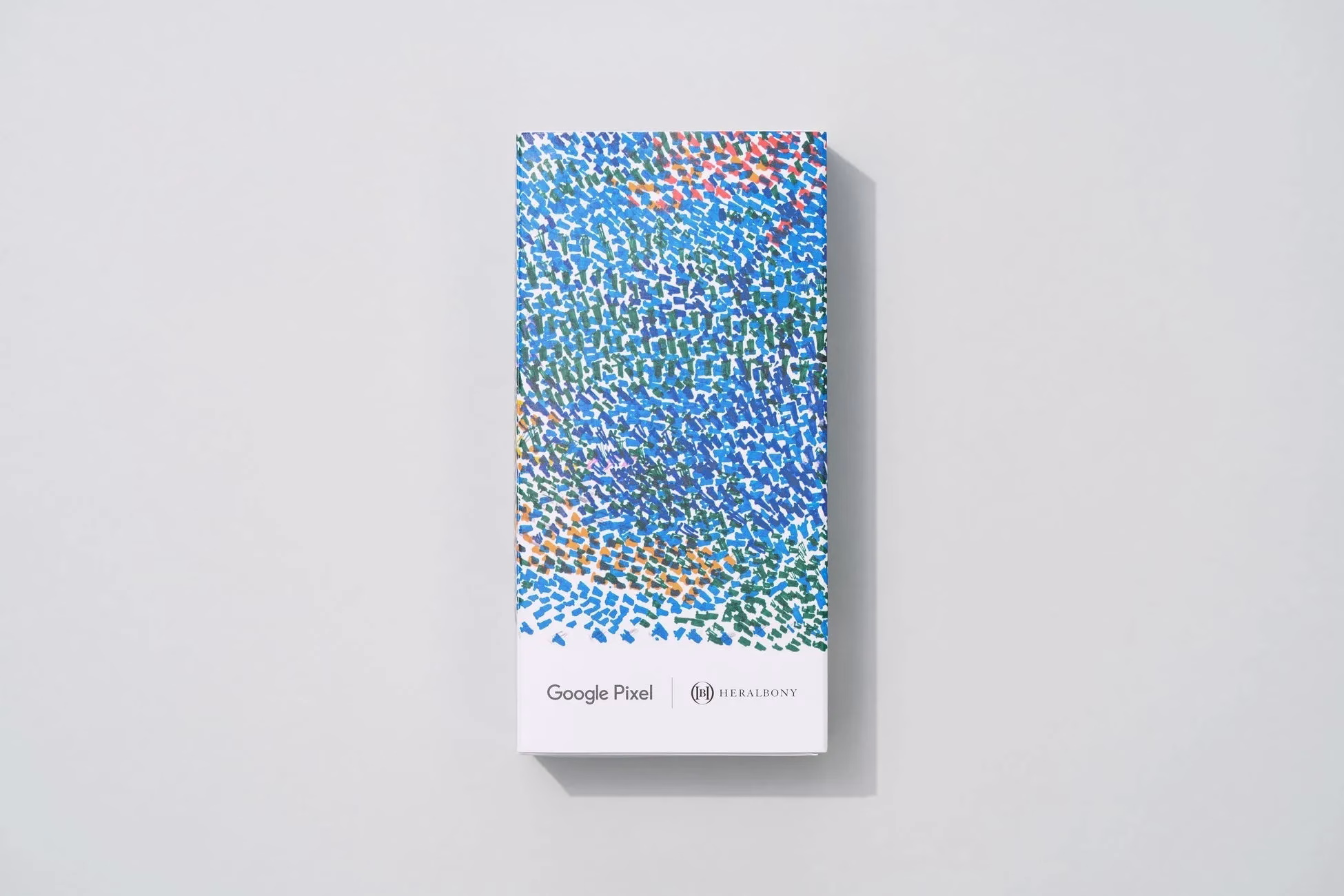 Google Pixelの製品パッケージ。青を基調とした抽象的なデザインが施されている。