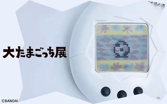 大たまごっち展の告知画像。たまごっち本体とロゴが特徴的。